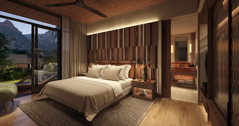 Rendering of a luxury casita bedroom at dusk with red rock views
