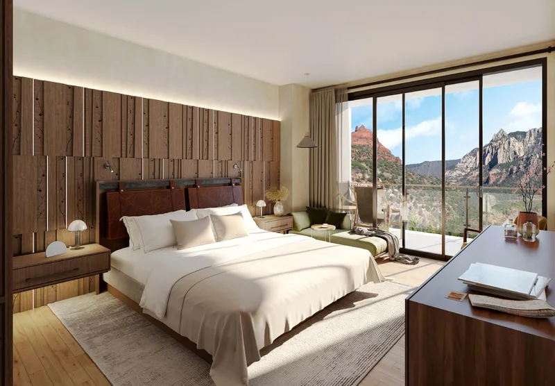 Rendering of a renovated tower guestroom with floor-to-ceiling glass and red rock views